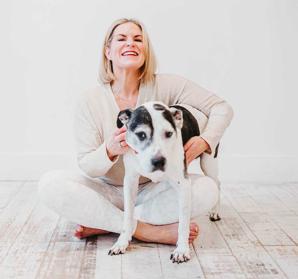 Melissa Trotman, owner of Vital You Functional Medicine based in Annapolis, Maryland, with her family dog.