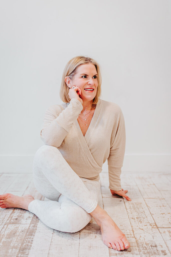 Melissa Trotman, owner of Vital You Functional Medicine based in Annapolis, Maryland, posing in a yoga pose.