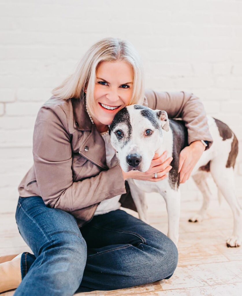Melissa Trotman, owner of Vital You Functional Medicine based in Annapolis, Maryland, with her family dog.